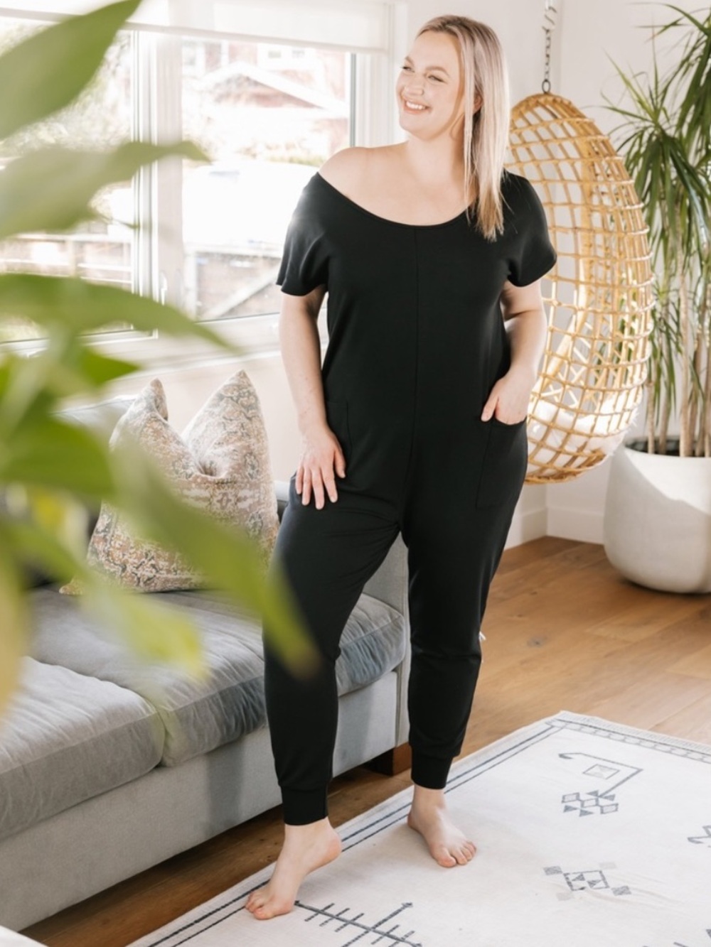 Smash + Tess small cozy Thursday romper jumpsuit black front pockets loungewear